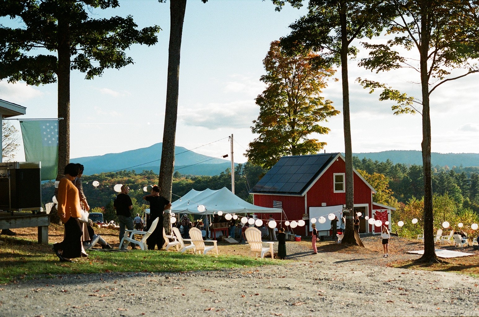 Photo of a study hall with wooden tables and chairs.